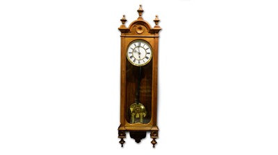 Lot 1160 - A Viennese burr walnut wall timepiece.