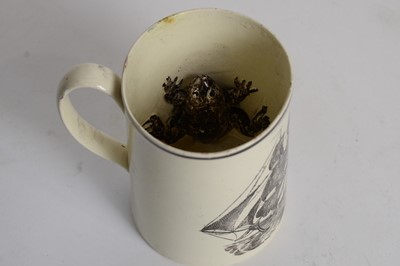 Lot 731 - Newcastle Pottery Creamware frog mug, and a Balls Deptford frog mug
