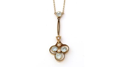 Lot 325 - An Edwardian aquamarine and seed pearl pendant