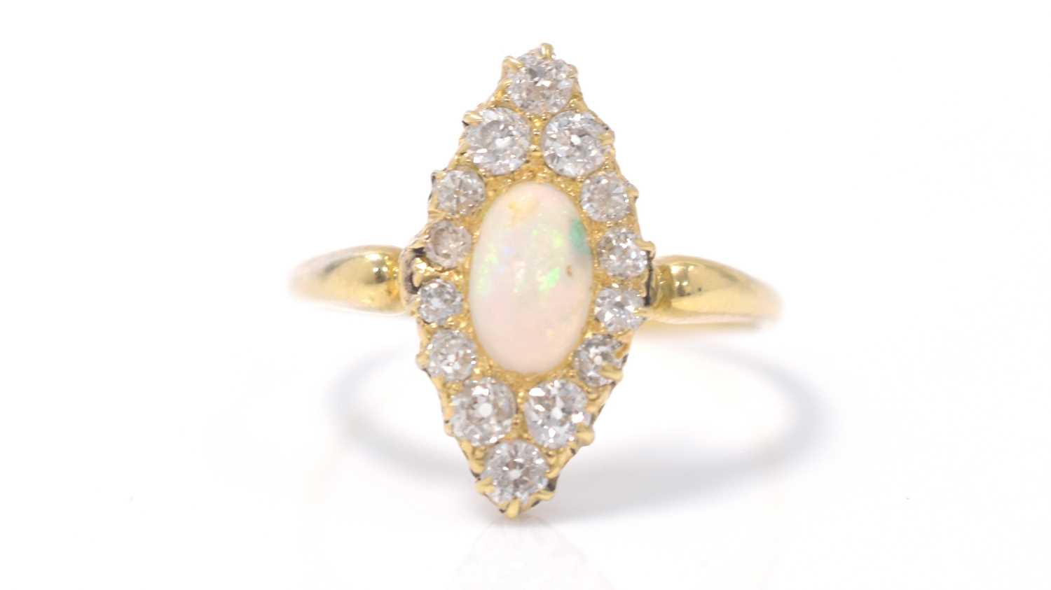 Lot 355 - A Victorian opal and diamond ring