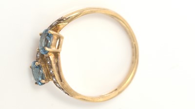 Lot 356 - A topaz and diamond ring