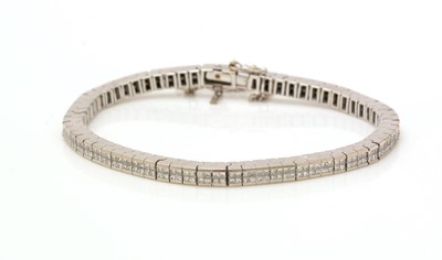Lot 457 - A diamond line bracelet