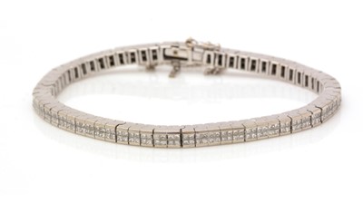 Lot 457 - A diamond line bracelet
