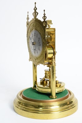 Lot - GUSTAV BECKER BRASS ANNIVERSARY CLOCK UNDER GLASS DOME