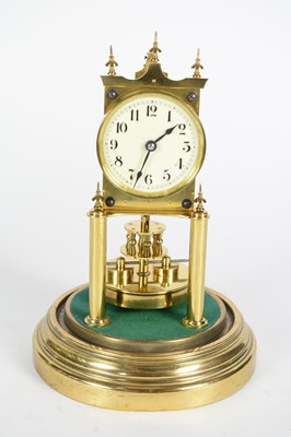 Lot 1188 - Gustav Becker: a 20th C brass 400-day anniversary/torsion clock.