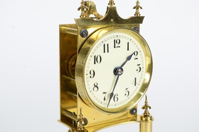 Lot 1188 - Gustav Becker: a 20th C brass 400-day anniversary/torsion clock.