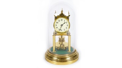 Lot 1188 - Gustav Becker: a 20th C brass 400-day anniversary/torsion clock.