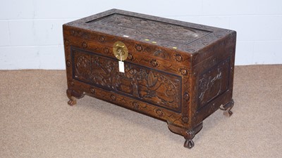 Lot 36 - A 20th Century Asian carved camphor wood blanket box.