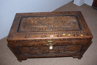 Lot 36 - A 20th Century Asian carved camphor wood blanket box.