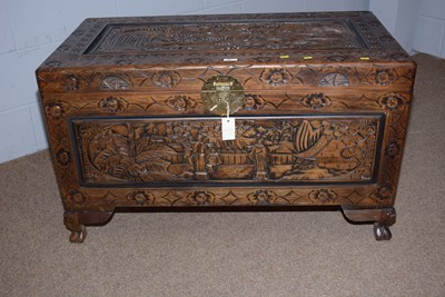 Lot 36 - A 20th Century Asian carved camphor wood blanket box.