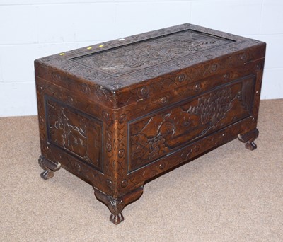 Lot 36 - A 20th Century Asian carved camphor wood blanket box.