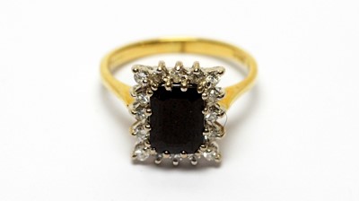 Lot 207 - A sapphire and diamond cluster ring, and a Jean Renet cocktail watch