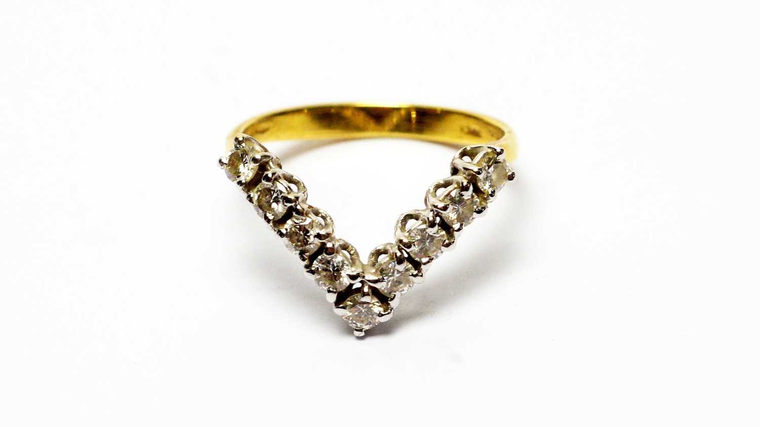 Lot 222 - A diamond wishbone ring
