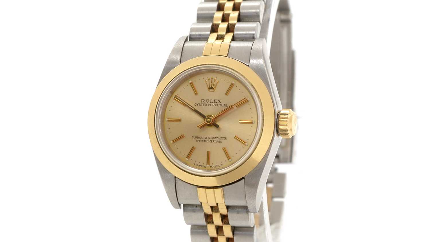 Lot 434 - Rolex Oyster Perpetual: a gold and steel-cased lady's automatic wristwatch