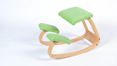 Lot 9 - Stokke after a design by Peter Opsvik: a bent plywood rocking/kneeling chair.