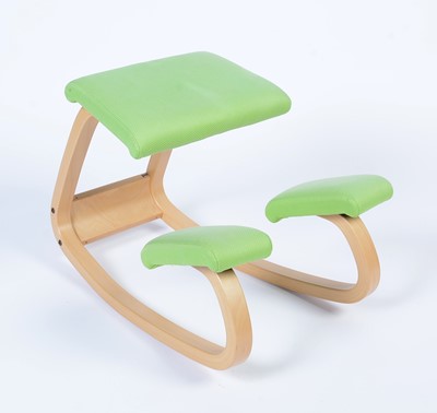 Lot 9 - Stokke after a design by Peter Opsvik: a bent plywood rocking/kneeling chair.