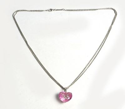 Lot 503 - Chopard "So Happy Diamond": a diamond and synthetic pink sapphire pendant
