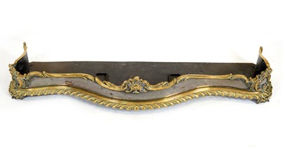 Lot 1257 - A fine Victorian moulded brass and steel fire curb.