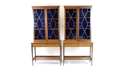 Lot 1303 - A pair of Sheraton Revival mahogany display cabinets on stand.