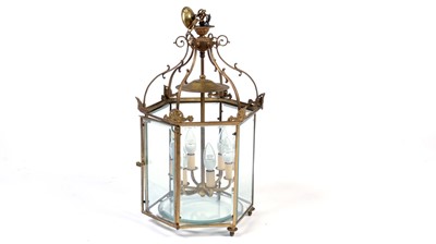 Lot 1069 - A Regency-style hexagonal brass ceiling lantern.