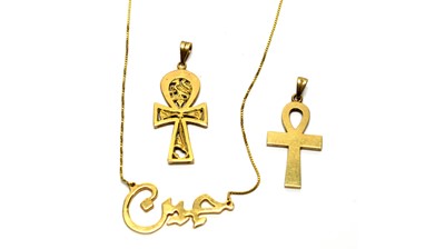 Lot 158 - Two gold cross pendants and a necklace.