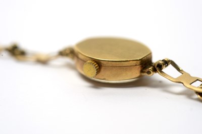 Lot 161 - Three 9ct yellow gold chains and a cocktail watch
