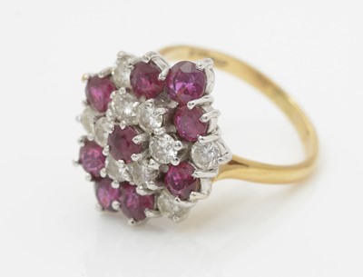 Lot 475 - A ruby and diamond cluster ring