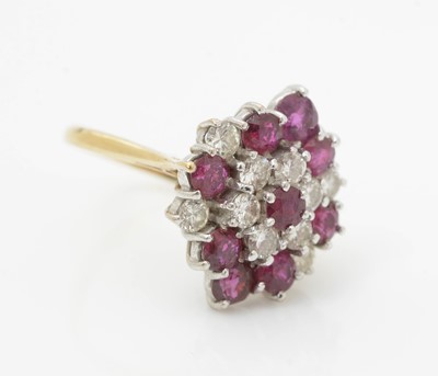 Lot 475 - A ruby and diamond cluster ring