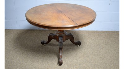 Lot 52 - A Victorian mahogany tea table; and a Victorian walnut circular tilt-action breakfast table.