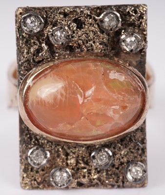 Lot 1155 - A fire opal and diamond ring