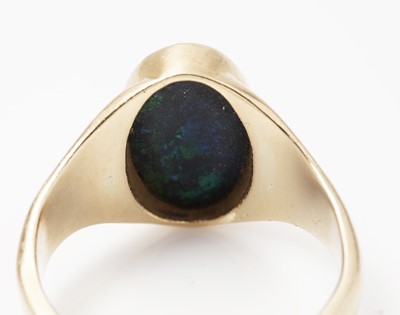 Lot 1157 - A black opal ring