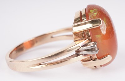 Lot 1158 - A fire opal and diamond ring