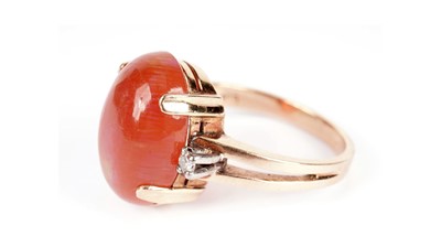 Lot 1158 - A fire opal and diamond ring