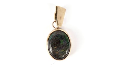 Lot 1159 - A black boulder opal pendant