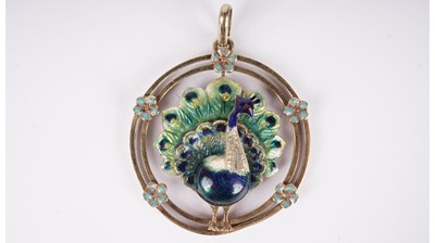 Lot 1166 - A late 19th Century peacock pattern pendant
