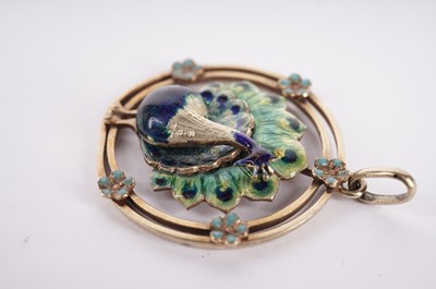 Lot 1166 - A late 19th Century peacock pattern pendant