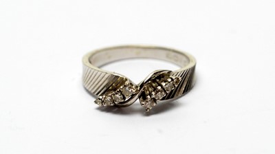Lot 204 - A diamond dress ring