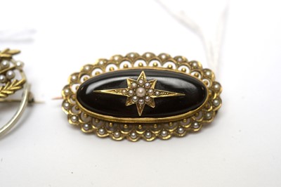 Lot 188 - A mourning brooch; and two others.