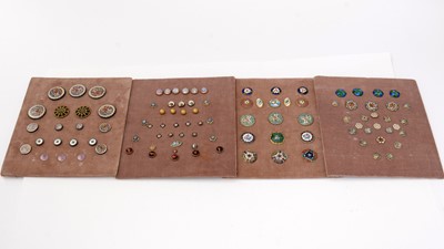 Lot 211 - A collection of enamel buttons