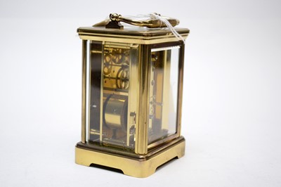 Lot 259 - A 20th Century Angelus brass cased carriage clock.