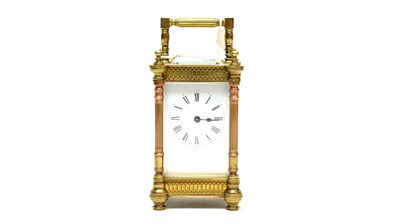 Lot 254 - A late 19th Century brass carriage clock.