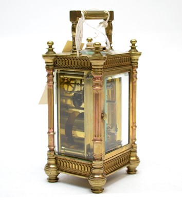 Lot 254 - A late 19th Century brass carriage clock.