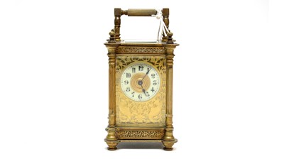 Lot 260 - A 19th Century French champleve enamel carriage clock.