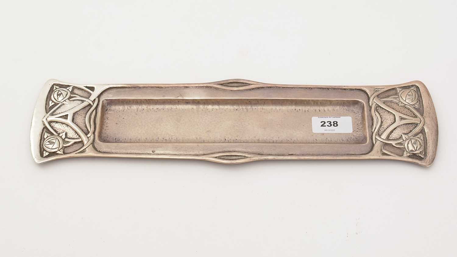 Lot 238 - A silver coloured metal tray, of Arts and Crafts design