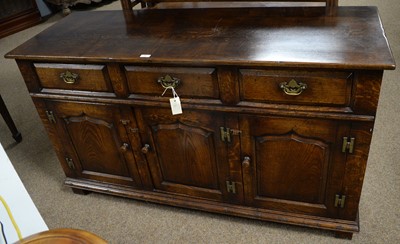Lot 72 - Attributed to Titchmarsh and Goodwin: a Georgian-style oak dresser.