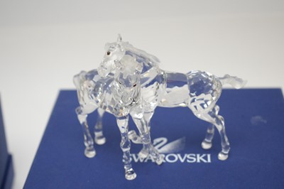 Lot 425 - A collection of Swarovski horses.