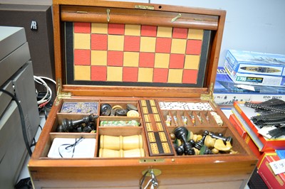 Lot 541 - A late 19th/ early 20th Century mahogany games box.