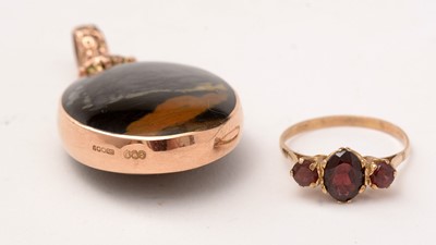 Lot 132 - A 9ct rose gold pendant, together with a garnet ring