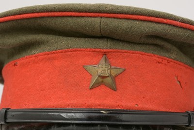 Lot 823 - A Japanese Imperial army student's cap; and two puttee straps.