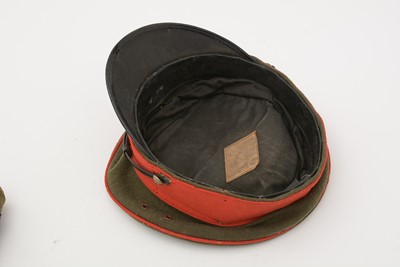 Lot 823 - A Japanese Imperial army student's cap; and two puttee straps.